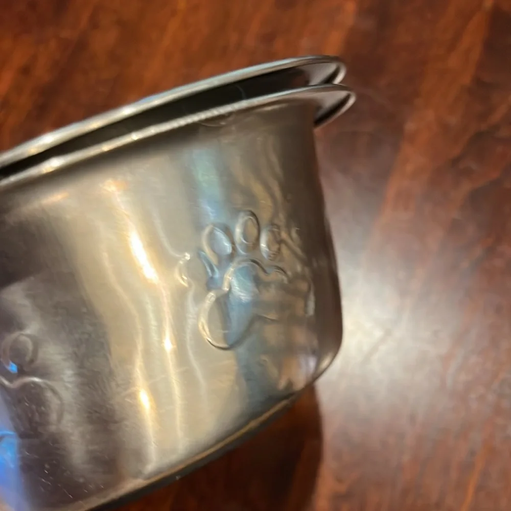 Two small metal dog bowls